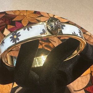 SOLD
Kurt Geiger Gold and White Floral Bracelet